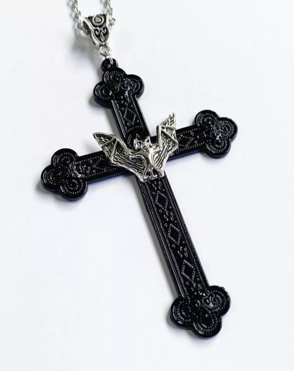 Cross with bat necklace